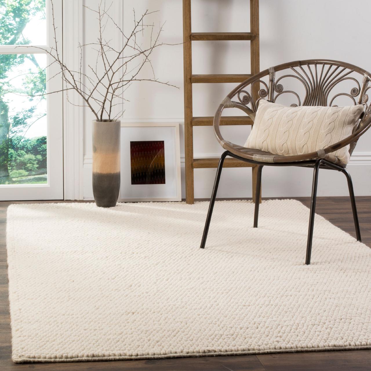 SAFAVIEH Naturals Feride Solid Braided Wool Area Rug for Living Room